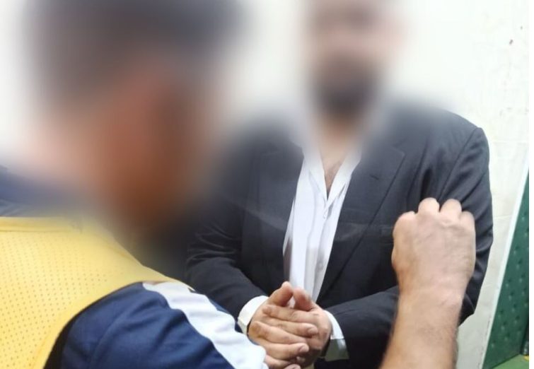 لحظه دستبند زدن به ضارب افشین پیروانی +عکس
